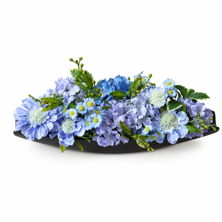 Blue artificial flower arrangement in a low black tray