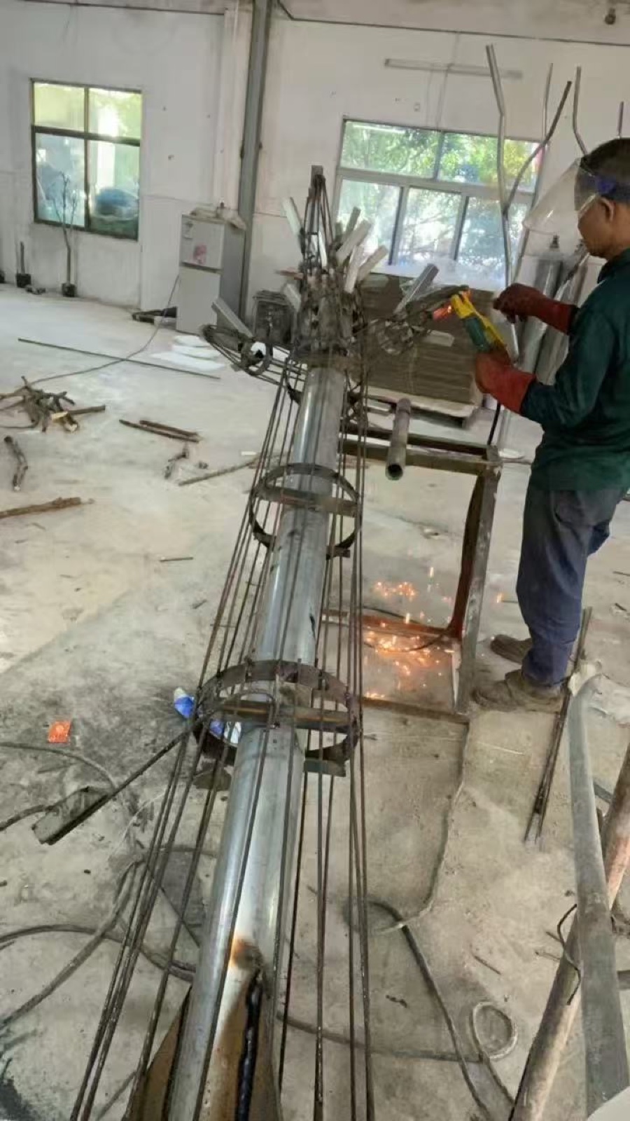 LBA factory worker crafting the internal structure of an artificial tree